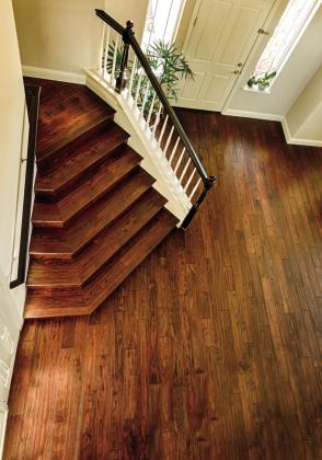 Some studies show wood floors can increase your home’s value by 3 to 5%. Stock photo