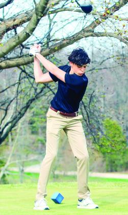 Leland’s Hayden VanSteenhouse drills a drive at during a Leland golf invitational on Monday. Enterprise photo by Brian Freiberger
