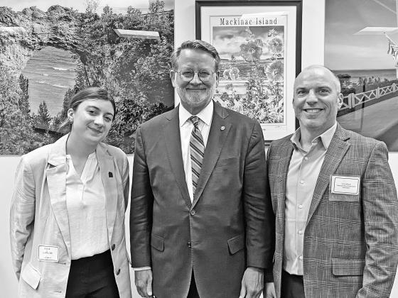 Addison LaPugh (left), Michigan senator Gary Peters (middle), and Eric LaPugh pose for a picture in Washington D.C. last week. Enterprise photo by Brian Freiberger