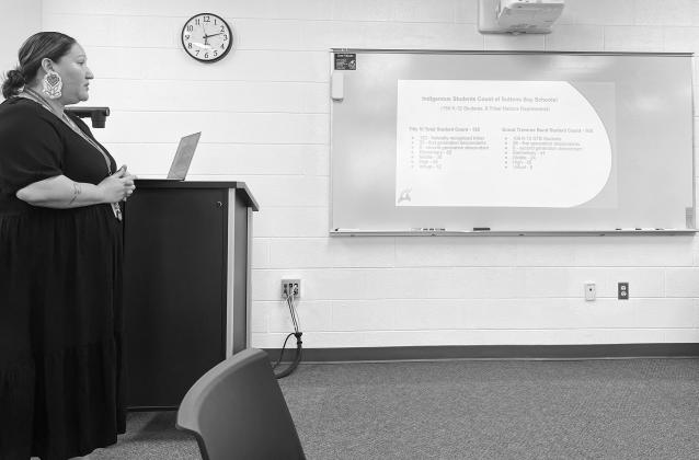 Suttons Bay Public Schools’ Indigenous Education Director Samantha TwoCrow is pictured presenting during the Title VI hearing at last week’s Board of Education meeting. Enterprise photo by Meakalia Previch-Liu