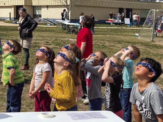Northport Public School students, as well as other districts throughout the county, made time to get outside and watch the total solar eclipse Monday afternoon. Enterprise photo by Meakalia Previch-Liu