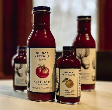Daniel Caudill launched his first products, a quince hot sauce and a quince ketchup, from his new company “Northport Orchards” this year. Photo courtesy of Daniel Caudill
