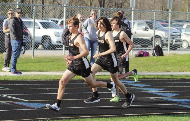 Glen Lake runners Abraham Feeney, Dexter Martin, and Dean McKellar raced solo in the first two-mile race of the season on Tuesday. Enterprise photo by Brian Freiberger