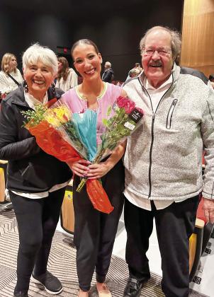 Joan and Dale Blount are pictured with their granddaughter, Erica Brown, after her performance with Michigan State’s Spartan Showstoppers dance team. Photo courtesy of Joan Blount