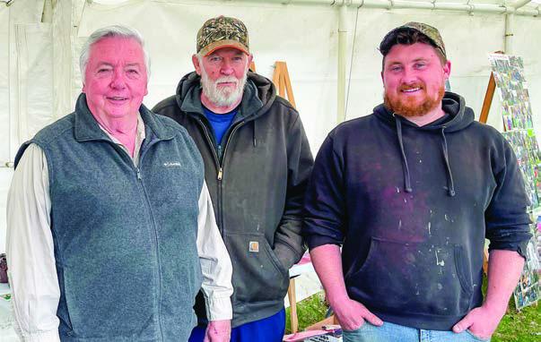 The annual Kid’s Fishing Day is organized by the Northport Sportman’s Club. Some of the group members from left to right are: Clay Groomes, Walter Wien, and Ryan Blessing.