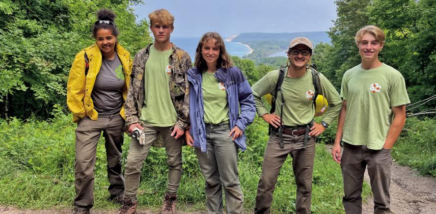 Great smiles greet a great view on a project at an overlook along Pierce Stocking Trail. Working to improve the overlook on a 2021 proctor are, from left, Isabell Astor, Cael Katt, Reeve Katt, Girard Marotto, and Connor Slaggert. Courtesy photo