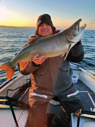 Ryan Noonan took this 15-pound lake trout from West Grand Traverse Bay, by jigging from a 17-foot boat in about 150 feet of water. With ice remaining unsafe though most of Michigan, anglers are finding other ways to fill their freezers. Courtesy photo