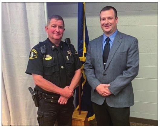 Corrections Sgt. Tom Verschaeve is pictured, right, with Undersheriff Jim Kiessel. Courtesy photo
