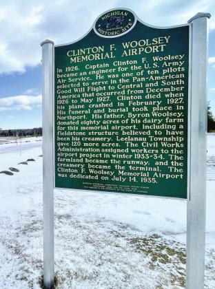 The historical marker contains background on either side of the Woolsey family farm and Clinton F. Woolsey Memorial Airport. This particular side highlights Captain Woolsey and how he was selected as a pilot to serve in the Pan-American Good Will Flight from 1926-27. The airport land was donated by Woolsey’s father, Byron, in memory of his son after he passed. Enterprise photo by Meakalia Previch-Liu