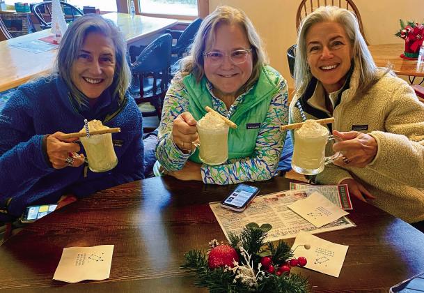 Friends will gather Friday and again Friday, Dec. 22 at Northern Latitudes Distillery for ‘Hygee,’ a Danish word for a cozy, warm feeling from time with friends and family. Profits from the event will benefit Leelanau Christian Neighbors’ Blessings in a Backpack program. Courtesy photo