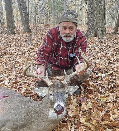 David Stachnik of Cedar thought a six-point stepped into the open on the first morning of firearms deer season. He was pleasantly surprised upon walking up on a 10-point. Courtesy photo