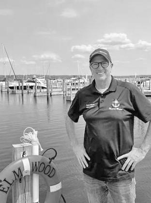 Pete Moon, harbormaster at the Elmwood Township Marina, stands on the docks on the West Arm Grand Traverse Bay in Elmwood. Courtesy photo